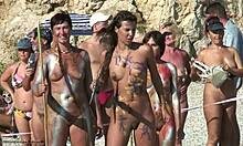 Various nudist babes posing with spears and looking like LARPers