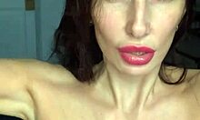 Russian pornstar Liza Virgin licks and spits on her armpits and big tits in close-up video