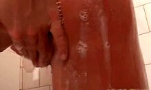 Teen with small tits masturbates in the shower and gets lathered up